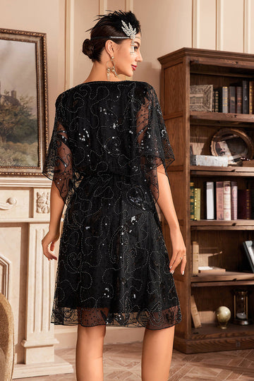Vestido de lentejuelas negras con mangas de murciélago de la década de 1920